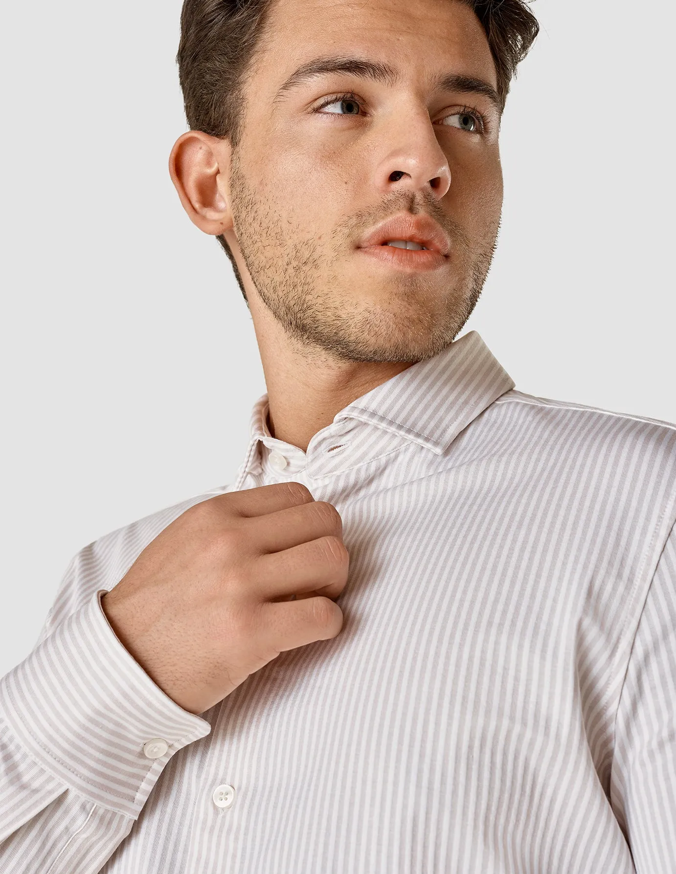 Certainly! Heres an optimized title for the e-commerce product:

Mens Slim Fit Classic Shirt with Grey and Lilac Stripes