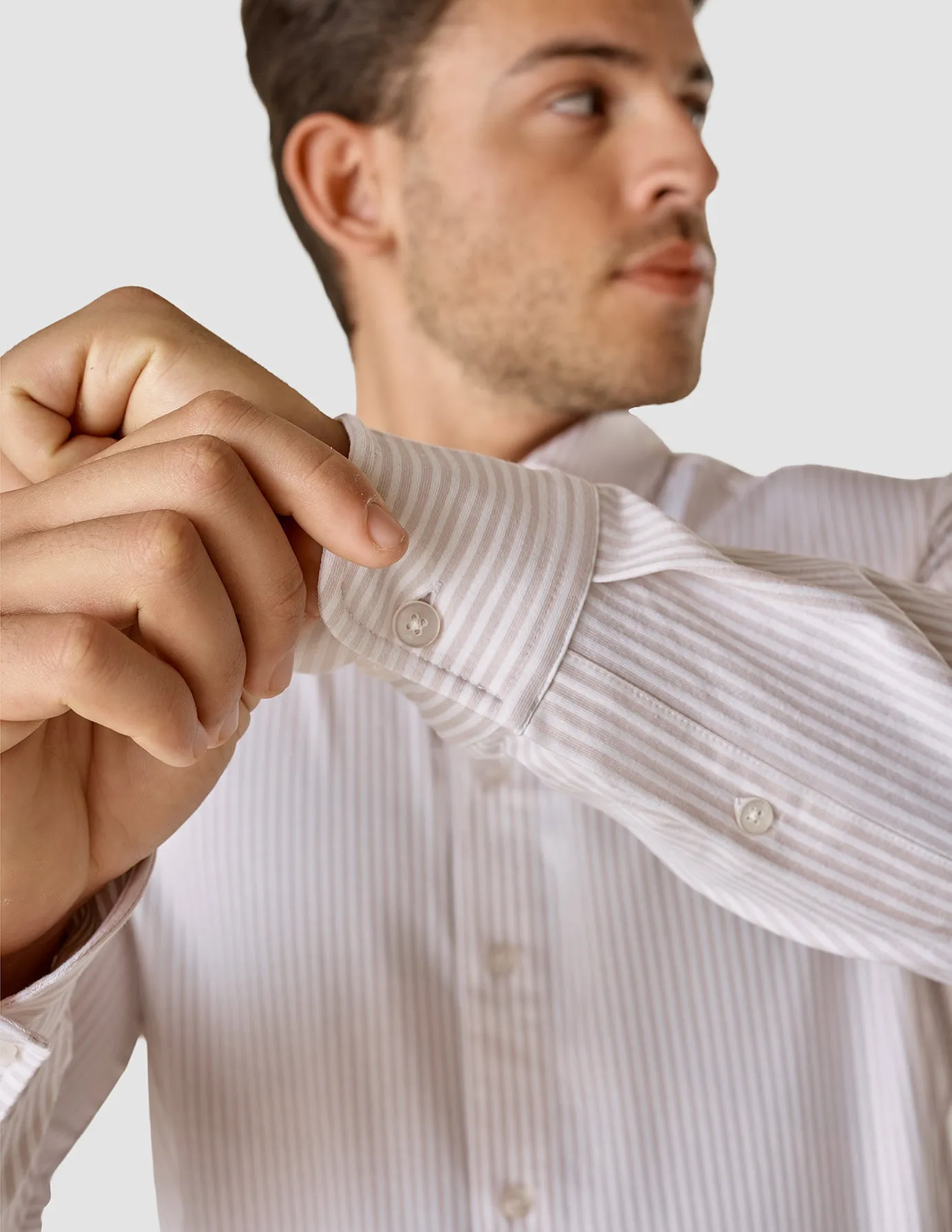Certainly! Heres an optimized title for the e-commerce product:

Mens Slim Fit Classic Shirt with Grey and Lilac Stripes